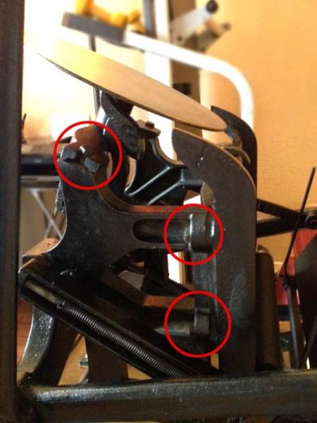 image: Do the circled bolts adjust the roller track and ink disk?