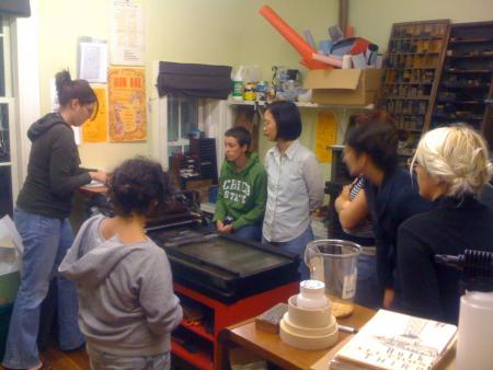 image: Letterpress workshop in process, 5 Students, 3 weeks, 4 hours a week.  Vandercook Proof Press #4.  The letterpress is in a room of its own attached to the main room.  